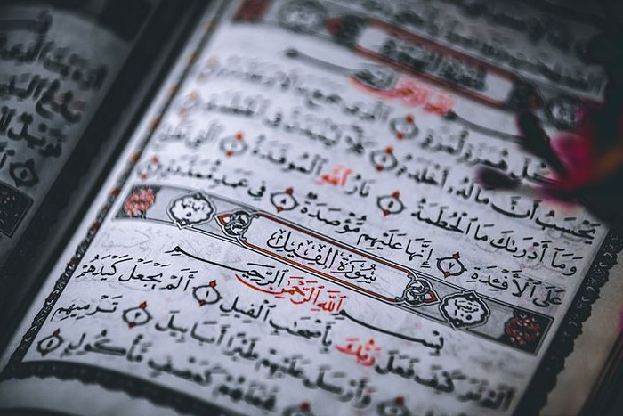 An open copy of the Holy Quran, for the Islamiyat classes